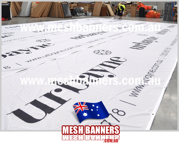 Printed shade netting as used to tie banners onto the construction fence