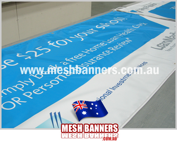 Blue banners on the workbench drying ready to roll